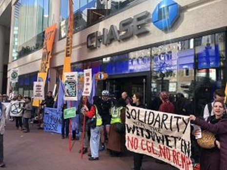 Dozens of local activists launched the ‘Stop the Money Pipeline’ campaign in Bay Area today with creative disruption at Chase Bank. These citizens demand JPMorgan Chase, the largest funder of fossil fuels worldwide, defund fossil fuels immediately to protect the planet. JPMorgan Chase, the world’s top banker of fossil fuels, has provided over $195 billion in financing to fossil fuel companies since the Paris Agreement in 2015. On the heels of Goldman Sachs and Blackrock announcements to divest from oil and gas, pressure is mounting on JPMorgan Chase, the world’s largest funder of fossil fuels. The action was coordinated by the Bay Area Climate Coalition, which includes Extinction Rebellion SFBay Area, Rainforest Action Network, 350 Bay Area, 350 Silicon Valley, XR Youth, Wetsuweten Solidarity Front Bay Area & Diablo Rising Tide.